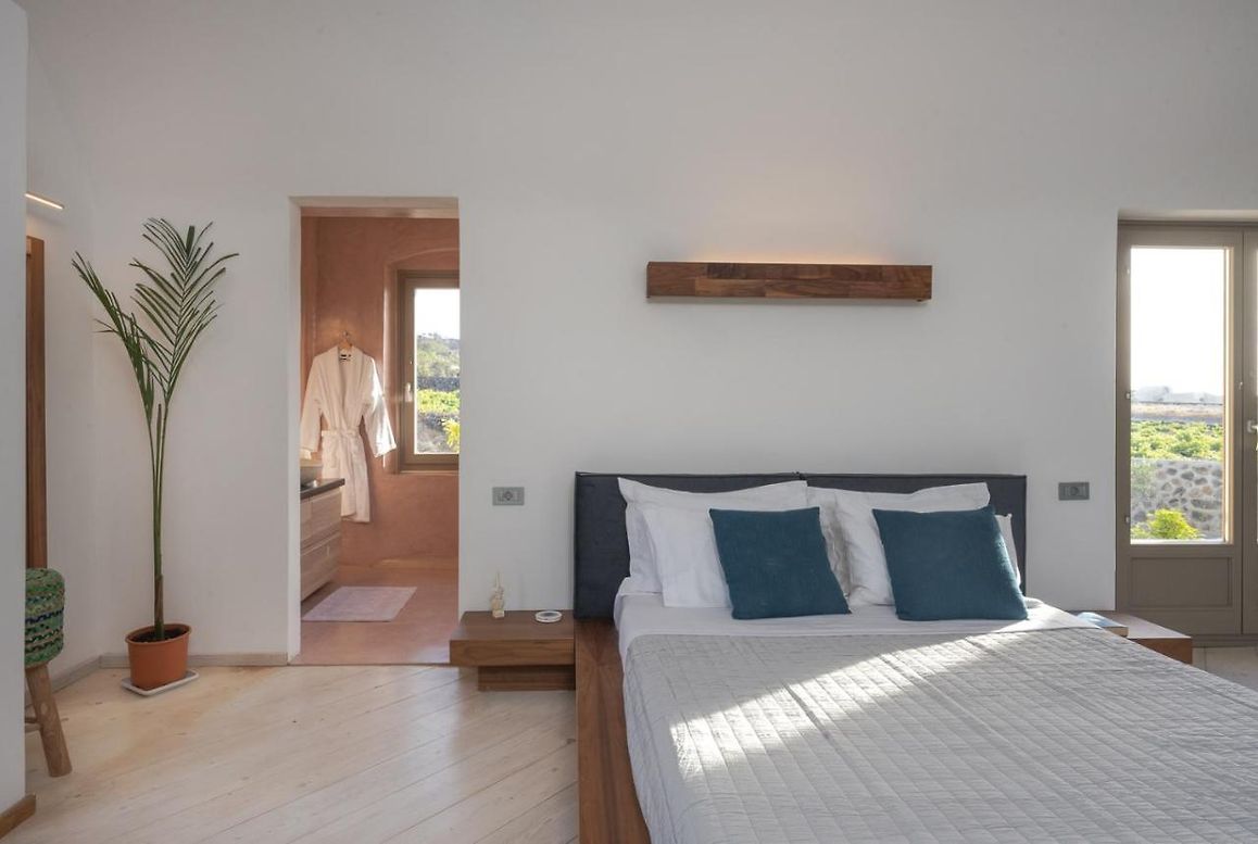 Ensuite bedroom with teal accents